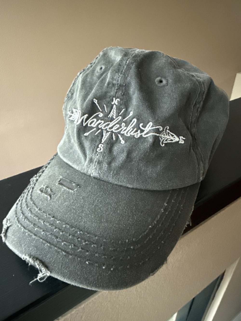 Wanderlust Ball Cap-distressed charcoal with white embroidery
